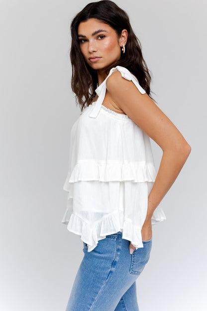 GILLI Sleeveless Asymmetrical Hem Line Tiered Top