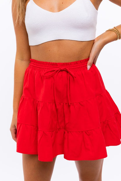 LE LIS Smocked Waist Flare Skirt