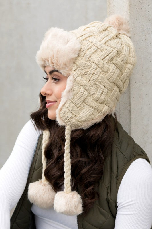 AILI'S CORNER Cable Weave Pom Trapper Hat