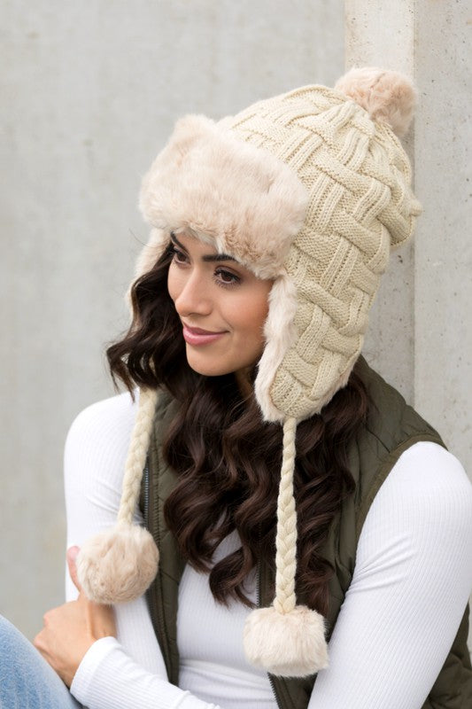 AILI'S CORNER Cable Weave Pom Trapper Hat