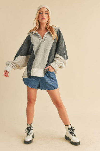 AEMI & Co. Stylish Oversized Hooded Lallie Sweatshirt with Exposed Seam