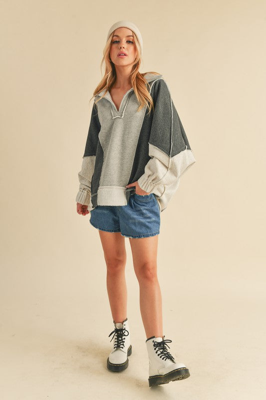 AEMI & Co. Stylish Oversized Hooded Lallie Sweatshirt with Exposed Seam