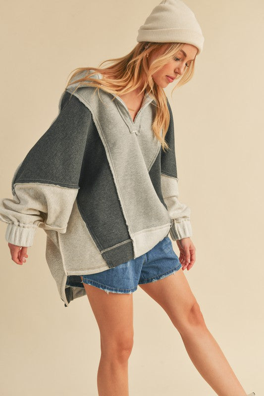 AEMI & Co. Stylish Oversized Hooded Lallie Sweatshirt with Exposed Seam