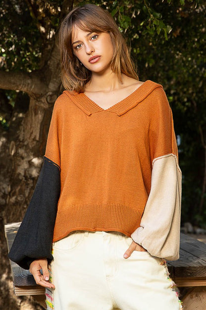 POL Women's Exposed Seam Roll Edge Color Block V Neck Sweater in Color Pumpkin