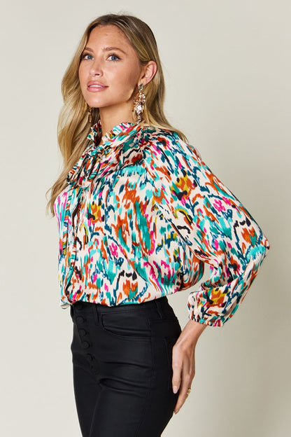 DOUBLE TAKE Full Size Printed Tied Neck Long Sleeve Blouse