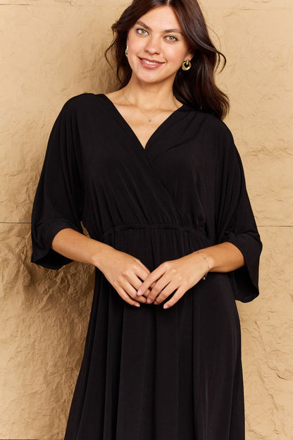 ON THE LAND Black Make Your Move Solid Surplice Midi Dress